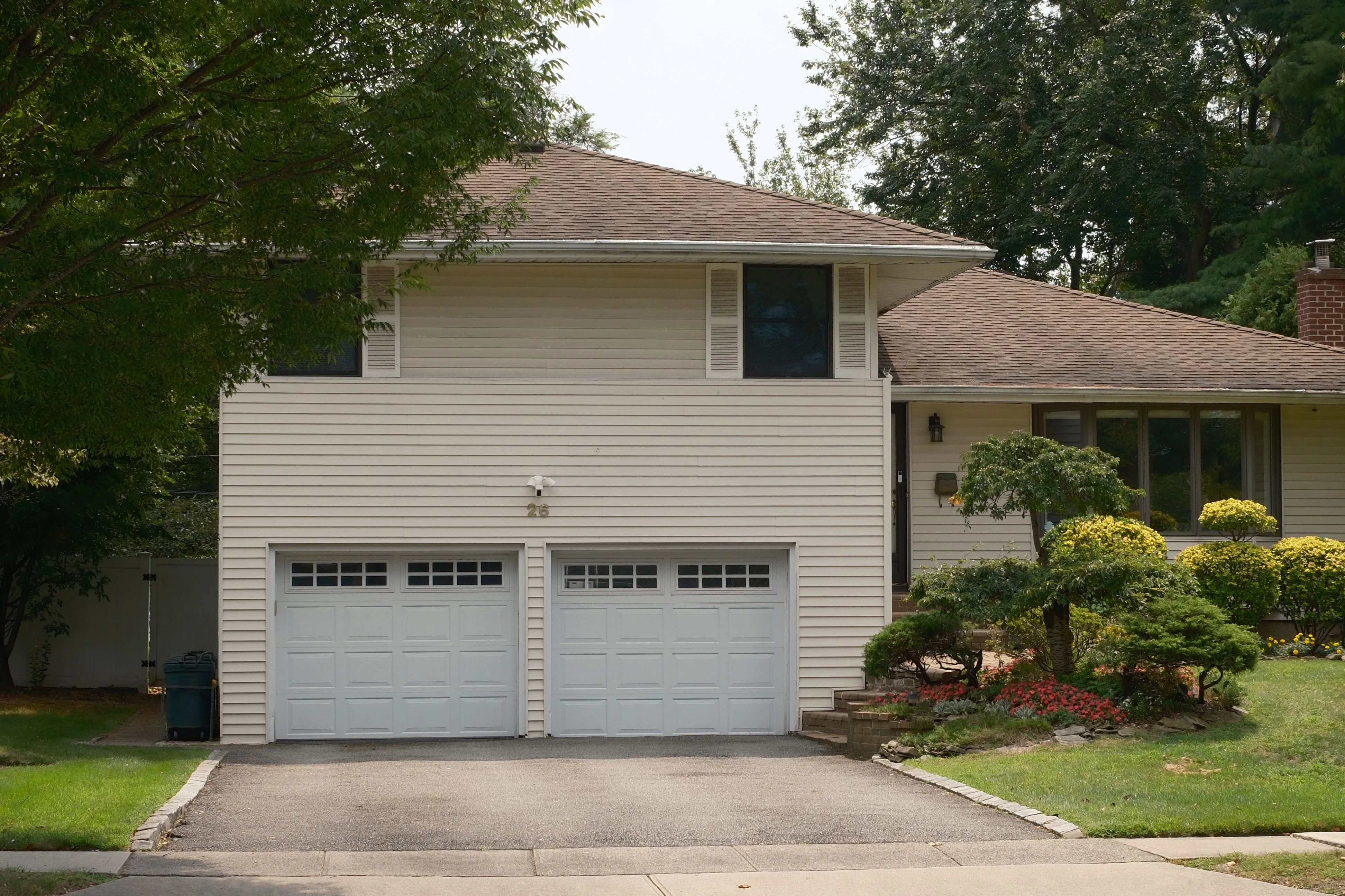 2000s-era Frisco Texas suburban home with attached garage